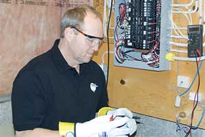 Master Electrician, Randy Frise, at work